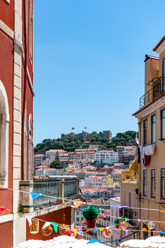 Portugal, Lisbon, Chiado, Calcada do Duque view of city with So Jorge Castle in distance