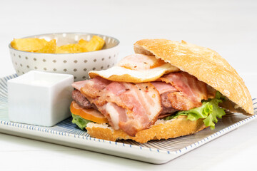 Special burger with bacon and fried egg