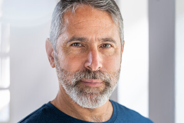 Portrait of mature grey haired man