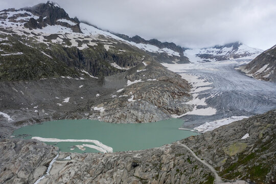 Switzerland, Valais, Rhone glacier, Aerial view of mountains and glacier