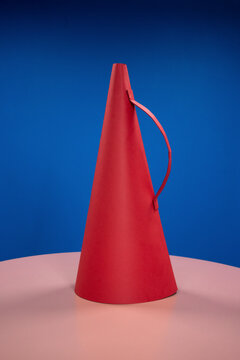 Red megaphone against blue background