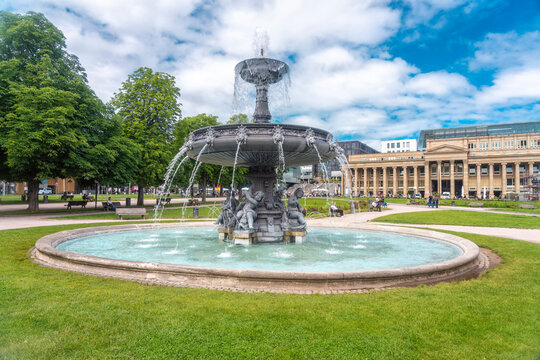 Germany, Baden-Wurttemberg, Stuttgart, Ornate fountain at Schlossplatz square with Konigsbau in background