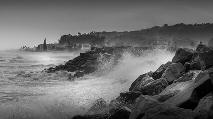 waves crashing on rocks