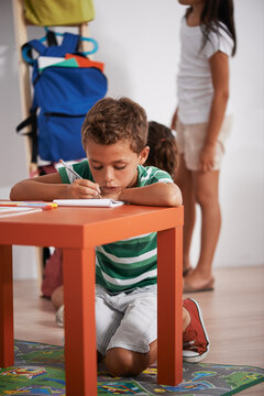 Schoolboy writing