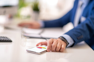 Man holding smart phone,close up