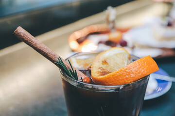 Orange juice espresso with ice, Black Coffee Tonic is the New Iced Coffee With Orange Juice. Cocktail of orange juice, ice and coffee in glass. Glass of espresso shot mixed with orange juice.