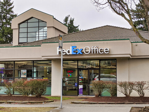 Bellevue, WA / USA - circa January 2020: Exterior of a FedEx post office store front in the Bellevue - Remond area near the Crossroads Bellevue shopping center.