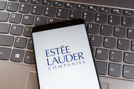 Toronto, On, Canada - March 11, 2021: The Est&eacute;e Lauder Companies logo on smartphone screen on keyboard. The Est&eacute;e Lauder Companies Inc. is an American multinational manufacturer. 