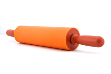 Orange plastic kitchen rolling pin isolated on white background