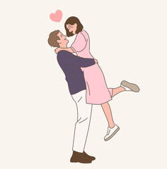 Romantic couple. The man is holding the woman.