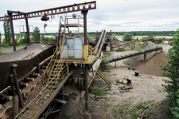 abandoned quarry, for the extraction of stone, old equipment, devastation