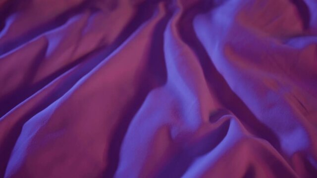 rumpled bed in bedroom at night, closeup view, white linen after sex or sleep