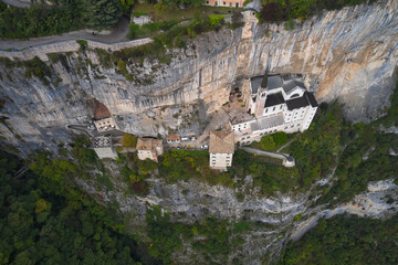 The unique Sanctuary Madonna della Corona church in the rock. Aerial view of the church on the...