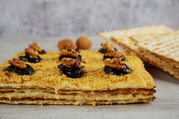Dessert for Passover matzo cake with prunes and walnuts.