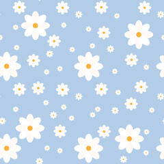 Seamless floral pattern. White chamomile or daisies on a blue background. Endless patterns for textiles and fabrics, wrapping paper, packaging. Vector image. Flat style