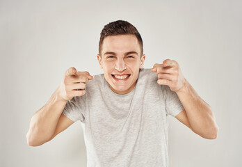 Cheerful man emotions gestures hands joy close-up