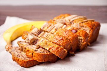 Sliced homemade banana bread. Healthy dessert concept.