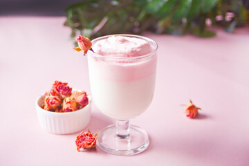 Glass of rose iced Dalgona whipped drink coffee