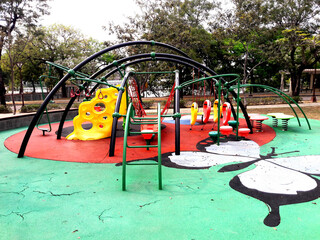 Rubber floor. Children's playground equipment playground paved on the surface of the EPDM sports field. An image of a children's playground with colorful EPDM rubber flooring