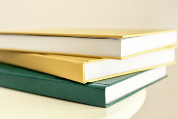 Stack of books on table, closeup