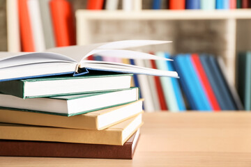 Stack of books on table in room