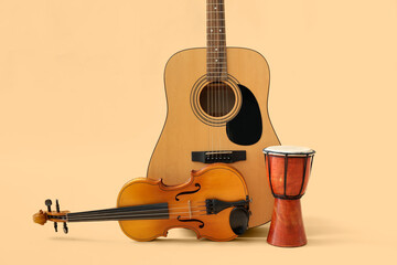 Different musical instruments on color background