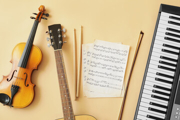 Different musical instruments and music notes on color background