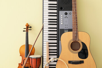 Different musical instruments on color background - obrazy, fototapety, plakaty