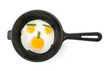Frying pan with tasty eggs and onion on white background