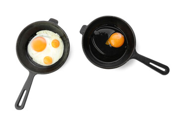 Pans with tasty fried eggs on white background