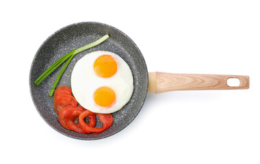 Frying pan with tasty eggs and tomatoes on white background