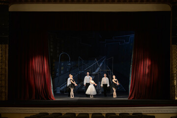 Dancers on stage in ballet theatre