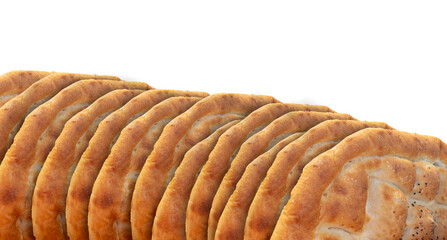 Ramadan pitas lined side by side on an insulated floor