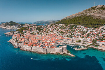 Fototapeta na wymiar Aerial drone shot of Old Port in Dubrovnik old town in Croatia summer midday noon