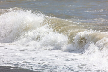 Wave on the seashore as a background.