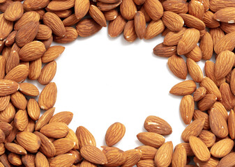 Close up of almond nuts isolated on white