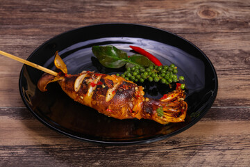 Grilled squid with sauce and hebs