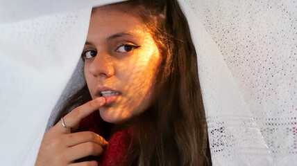 Teenage girl posing in front of the camera