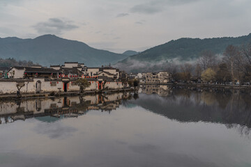 Fototapeta premium Hongcun village, a traditonal Chinese village in Anhui province, on a rainy day.