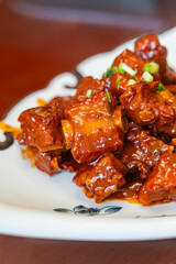 Braised spare ribs in brown sauce, a traditional Chinese cuisine.
