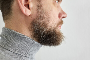 male short beard, portrait of a middle-aged man, side view