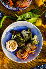 Topview image of grilled vegetables in a ceramic tableware