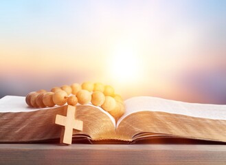 Holy Bible book on a wooden desk