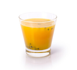 Passion fruit juice in glass isolated on white background with clipping path.