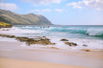 Fototapeta na wymiar Big waves at Keawaula Beach Yokohama bay seat coast of oahu hawaii