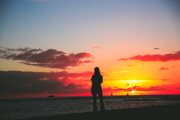 SUNSET BY THE SEA  AT WAIKIKI HONOLULU OAHU HAWAII - 419789034