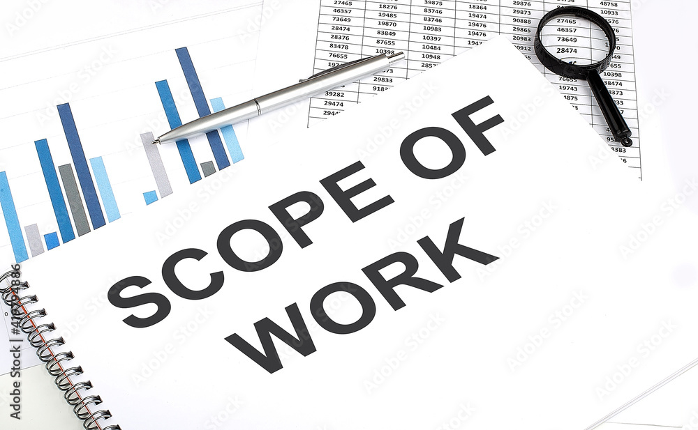 Fototapete In the notebook, the text SCOPE OF WORK , next to magnifier and a pen, the background is graphics.