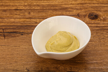 Dijon mustard sauce in the bowl