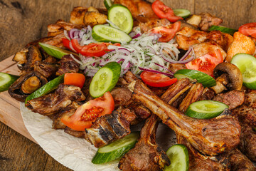 Grilled various meat mix vith vegetables