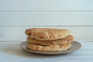 Pita bread on white background.